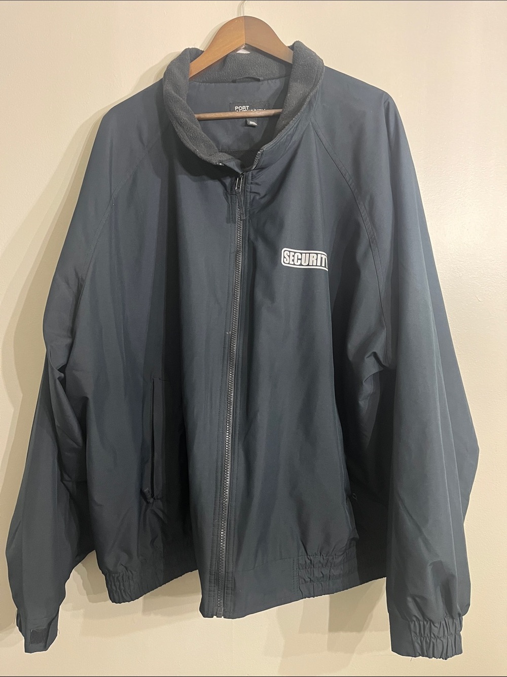 Port Authority Navy Windbreaker with reflective “Security” Logo